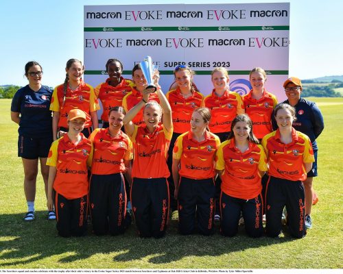 5 June 2023; The Scorchers squad and coaches celebrate with the trophy after their side's victory in the Evoke Super Series 2023 match between Scorchers and Typhoons at Oak Hill Cricket Club in Kilbride, Wicklow. Photo by Tyler Miller/Sportsfile